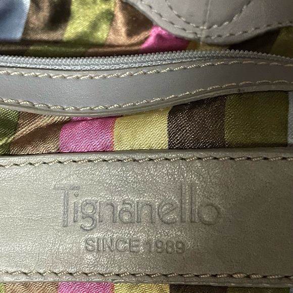 Great condition with clean divided interior. Has zippered compartments. - Picture 2 of 5